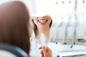 Woman having teeth examined at dentists